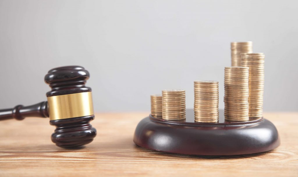 Gavel and a stack of coins