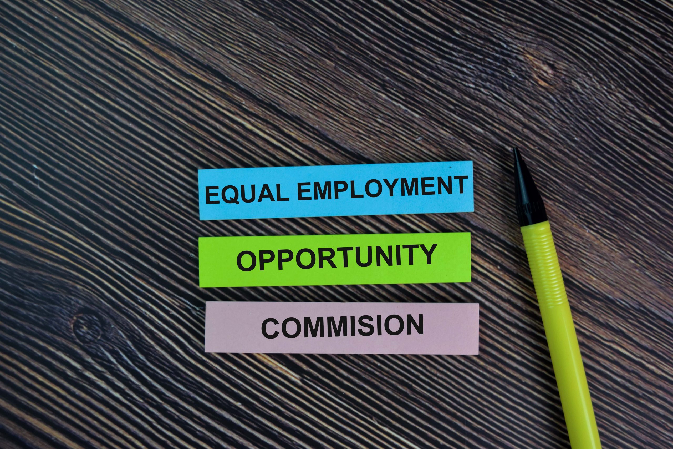 Pieces of paper that says Equal Employment Opportunity Commision