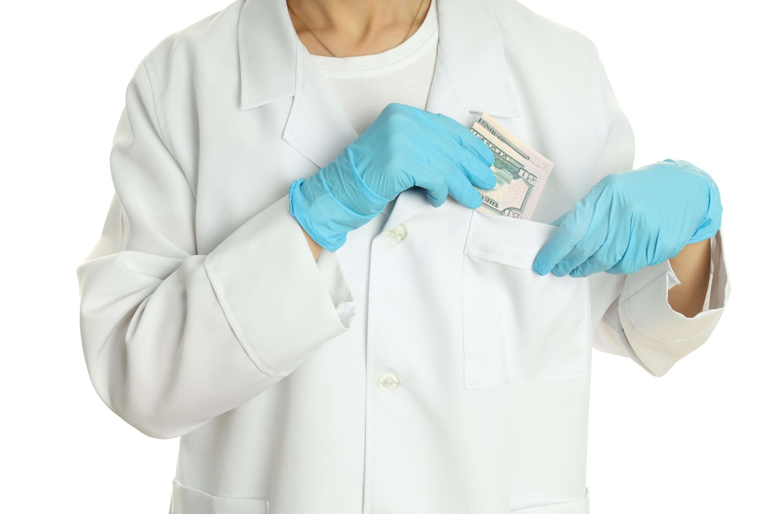 Health care worker pocketing cash into their uniform